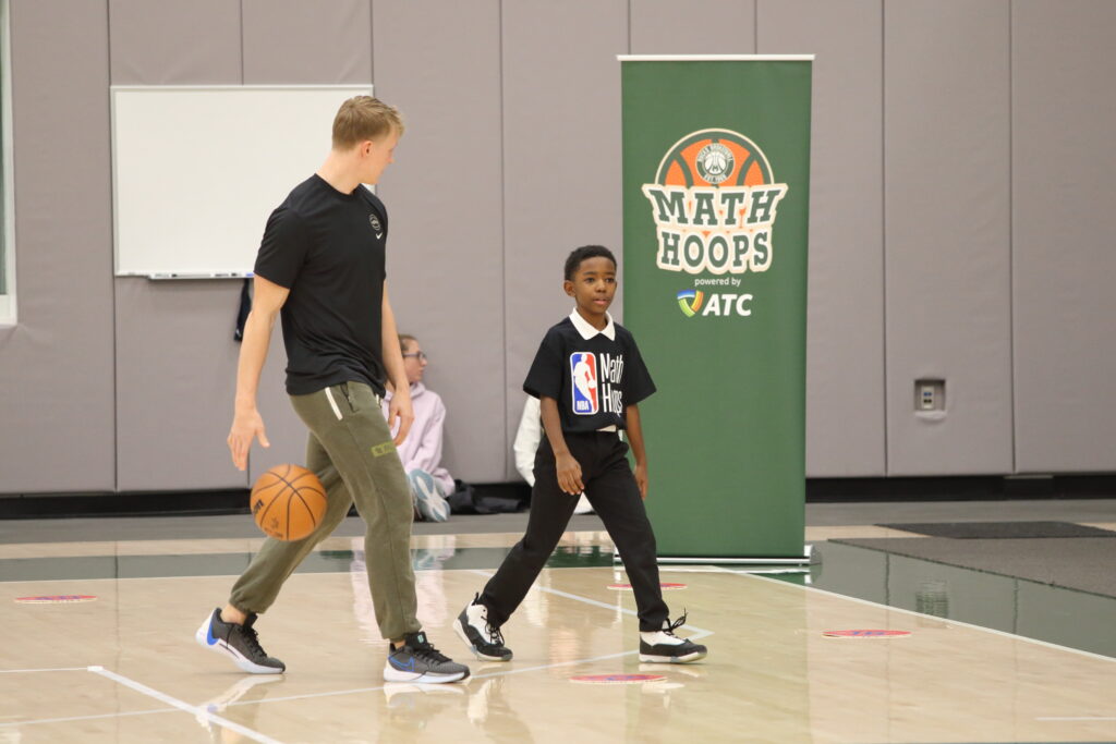 Just a casual stroll off the court with Bucks Guard AJ Green.